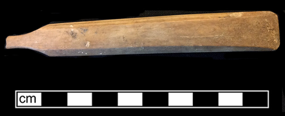 Bone handled toothbrush stamped “Warranted” on the reverse. Elongated hexagonal handle. Privy 5, filled between 1829-1837. 18BC79