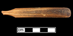 Bone handled toothbrush with indeterminate bristle attachment. Handle has hexagonal cross section; rounded base. 18BC66.