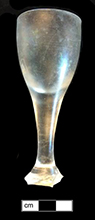 Colorless leaded stemmed glass with round funnel bowl and plain stem. Plain stems common c. 1730-1775 (Bickerton 1986:19). 18AN39