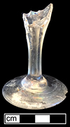 Colorless leaded stemmed glass with hexagonal fluted stem and unfinished pontil. Foot diameter: 2.5”. This vessel falls into Bickerton’s (1986:20) Facet Cut Stem category (1760-1810).  18BC33