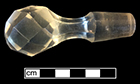 Colorless leaded glass stopper with six-sided stem. Length:  3.25”. 18BC33