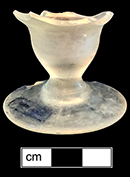 Colorless soda lime glass, possible salt, double ogee form (McKearin and McKearin1948). Base diameter: 2.13”. Lot 187-45. 18BC66