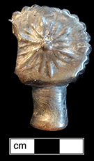 Colorless leaded glass contact molded stopper, most likely for a cruet due to its size. Height:1.75”, Stopper diameter: 1.25”. Lot: 321. 18BC79