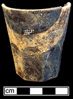 Colorless leaded glass tumbler.  Octagonal base. Rim diameter: 2.50”, Base diameter: 1.60”, Vessel height: 2.75”. Lot: 100. 18BC80