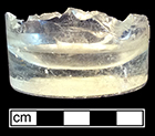 Colorless soda lime glass tumbler with heavy base.  Not empontilled. 2.75” base diameter. Lot 85, Vessel 35