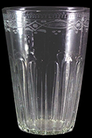 Colorless soda lime glass  tumbler or flip.  Wheel engraved below rim with wavy line and a row of hatched lozenges and dots. 3” rim diameter. Vessel 30 - Example on right from a private collection.  This motif was typical on drinking glasses produced by William Stiegel in Pennsylvania between 1763 and 1774 (McKearin and McKearin 1949).