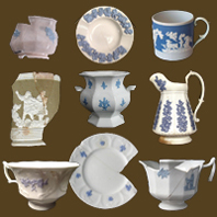 Various vessels with sprig molded designs.
