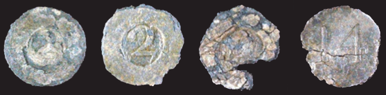 Figures 4-7 Archaeologically recovered pewter buttons with 