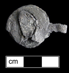 Figure 3 Lead cloth seal with impression of an 