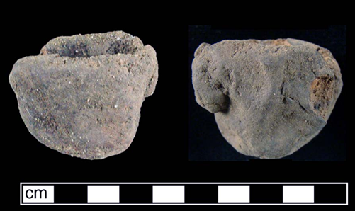 Two small clay pinch pots placed side by side.