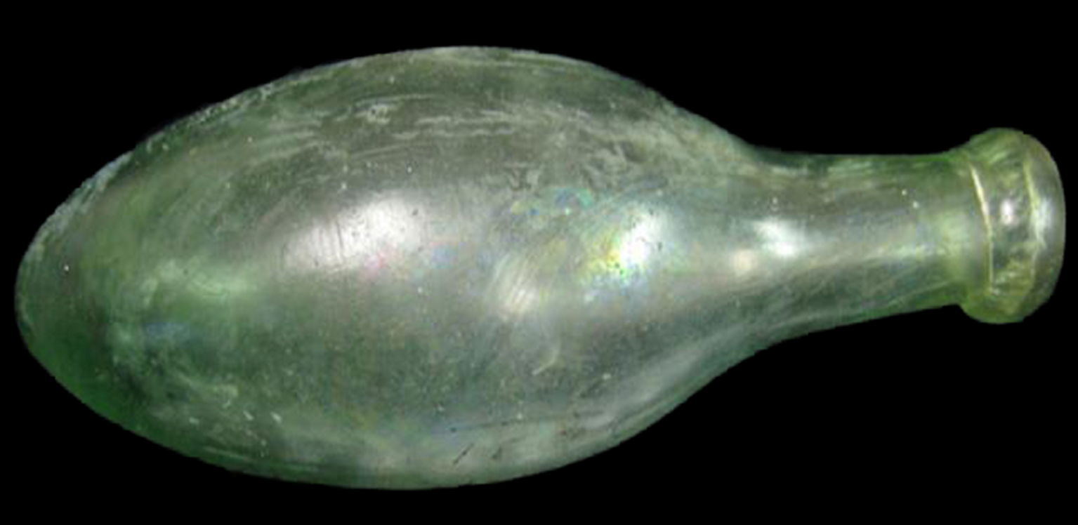 Blueish-green glass complete bottle with a rounded base.
