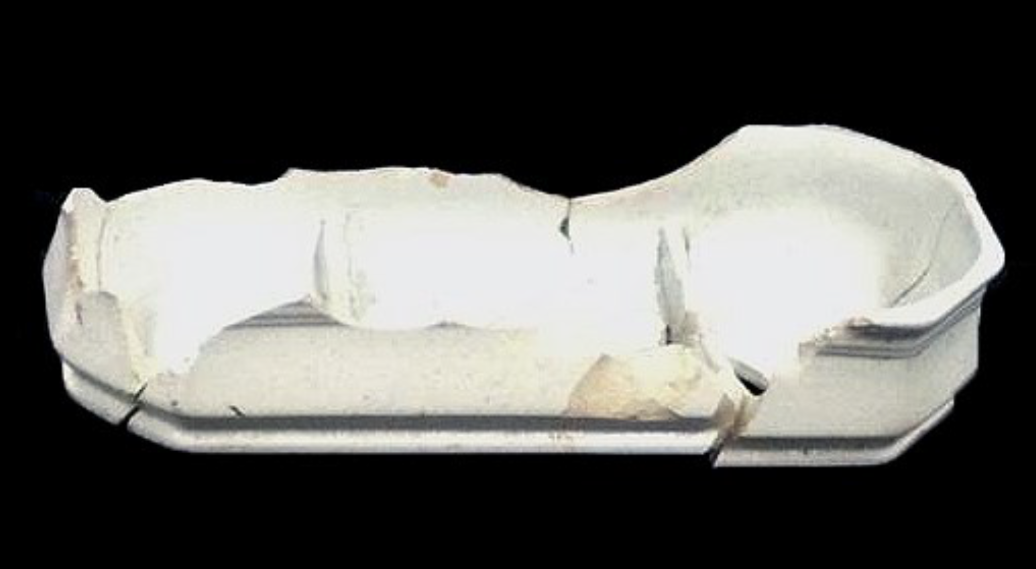 Rectangular white ceramic box.