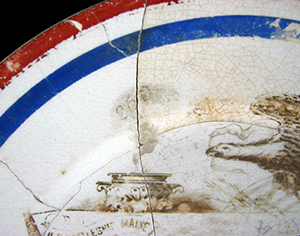 Detail of painted plate design showing an urn with smoke rising above it and the number 260.