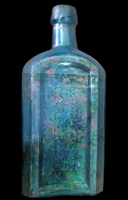 Pale blue sarsparilla bottle with rounded shoulders.