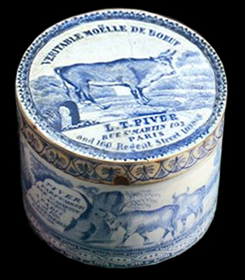 Complete example of a L. T. Piver ox marrow pomade jar with an image of an oxen on the lid.