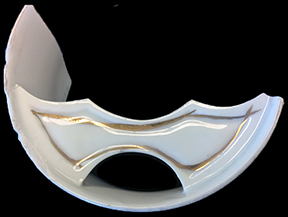 Photograph of top of porcelain mustache cup showing the mustache protector.