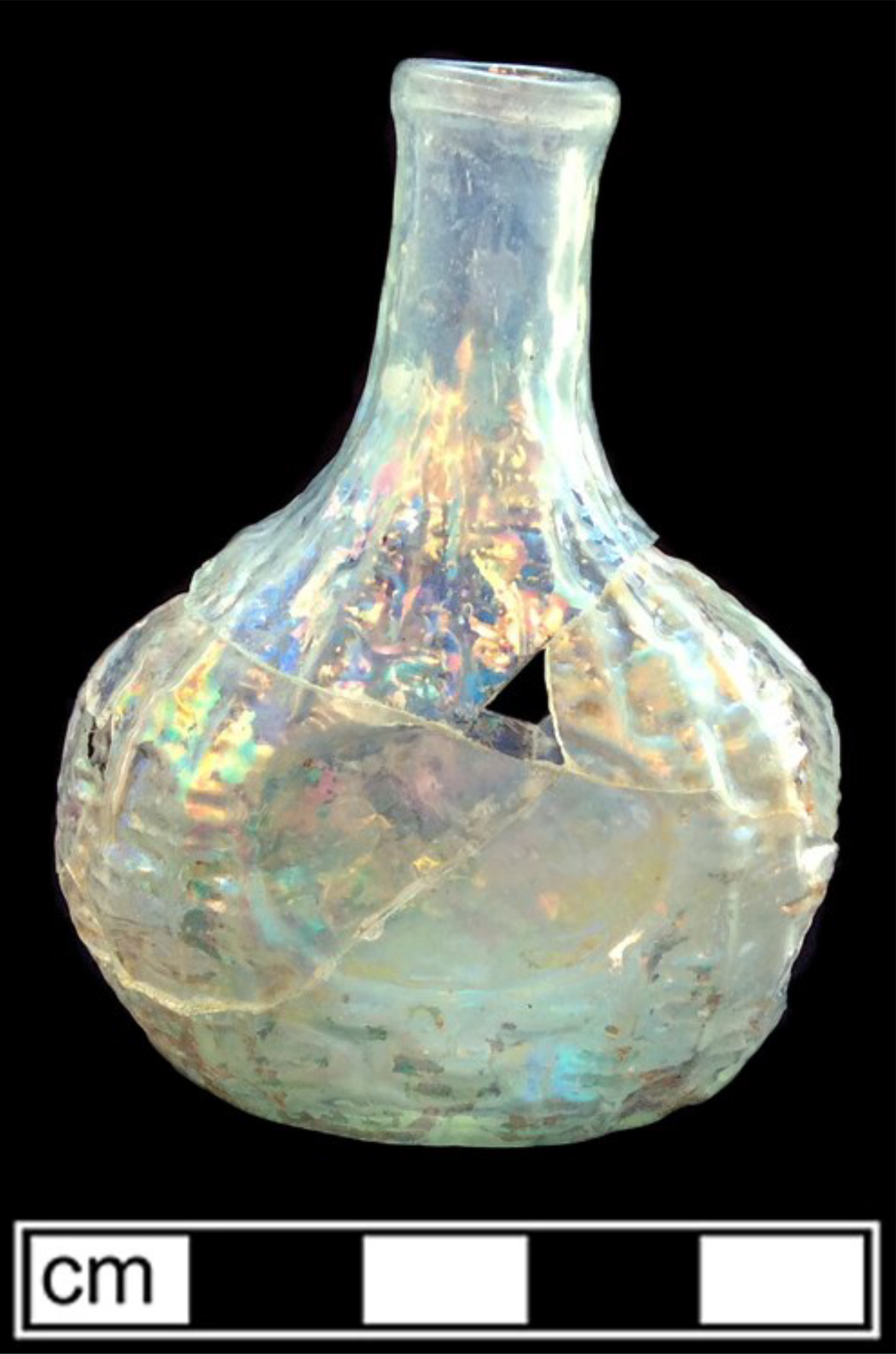 Light green cologne bottle molded with a wicker basket pattern.