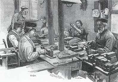 Black and white engraving showing two women in late 19th or early 20th-century dress working at a table making toy soldiers.