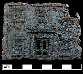 Square molded and unpainted iron piece with a door and five windows that formed the front of a cast iron bank.