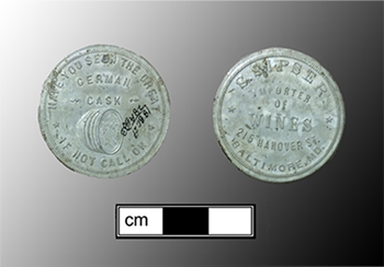Side-by-side front and back views of a circular aluminum token for the S. Sipser Wine and Liquor Merchant.