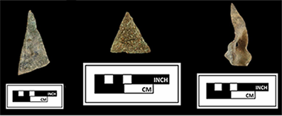 Photograph of three copper triangles.