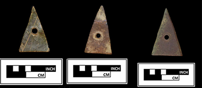 Photograph of three copper triangles