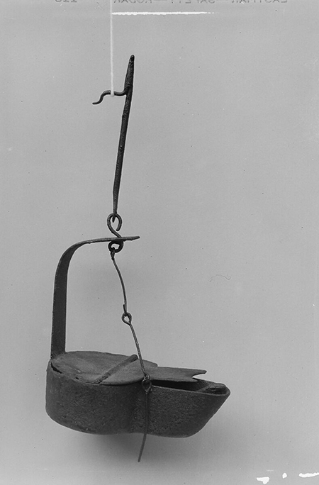Phoitograph of a hanging metal lamp.