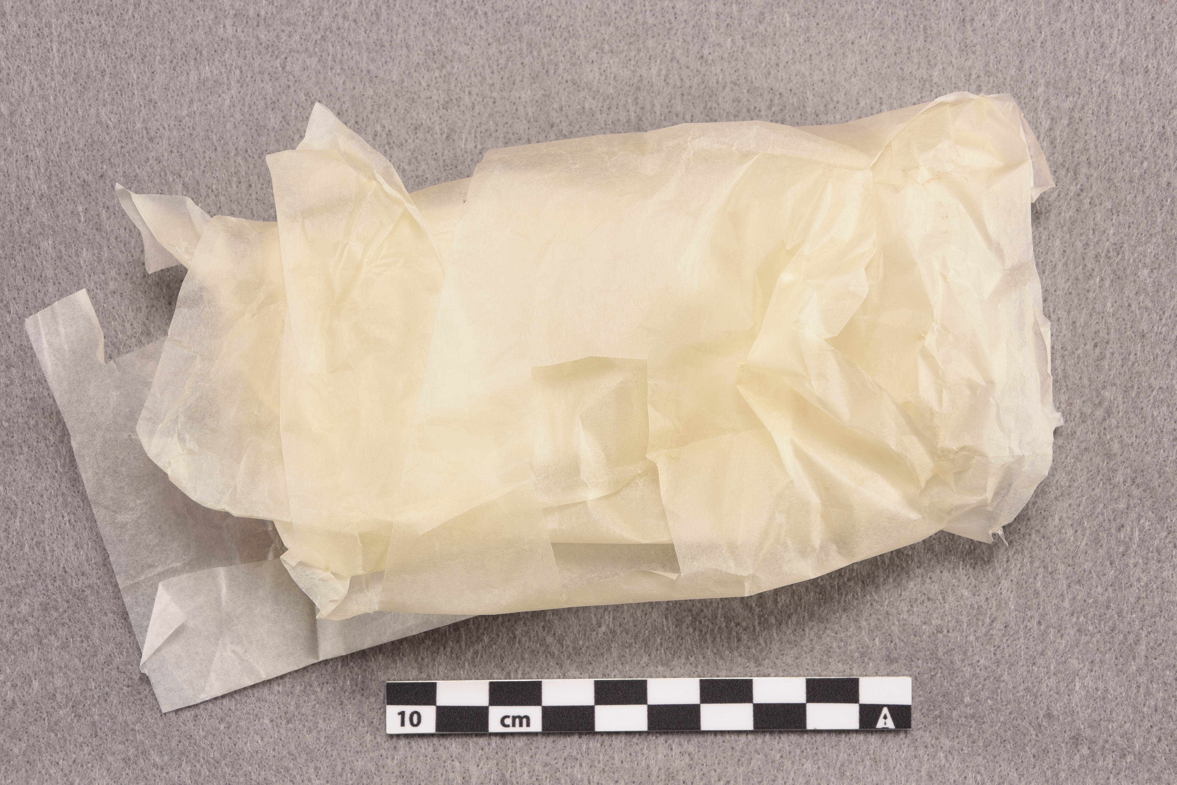 Figure 2 Tissue paper with a notable yellow and oily appearance.