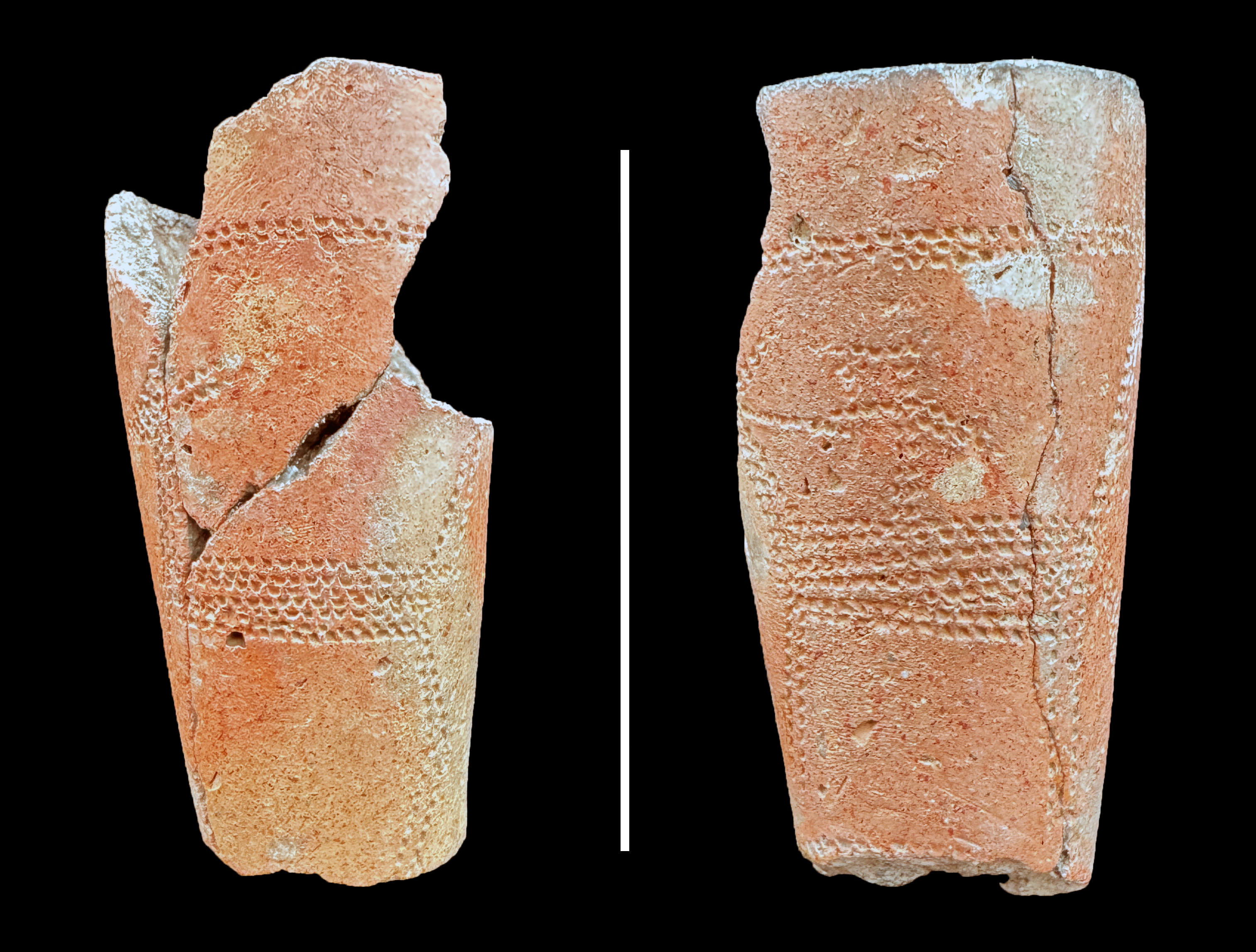 Photograph of two sides of a red clay tobacco pipe with stippled design depicting a deer or dog figure on the left and a possible human figure on top of a horse on the right.