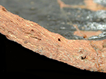 Profile of Buckley body sherd showing yellow and red striations in the paste, Angelica Knolls, 18CV60/1.094.&nbsp;