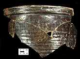 Exterior of a Buckley-type butter pot with ribbed body, from Angelica Knolls site 18CV60/1.094. 