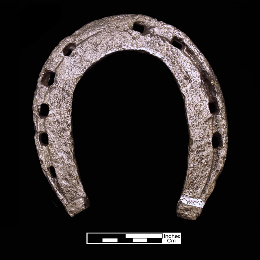 Image of iron horseshoe.