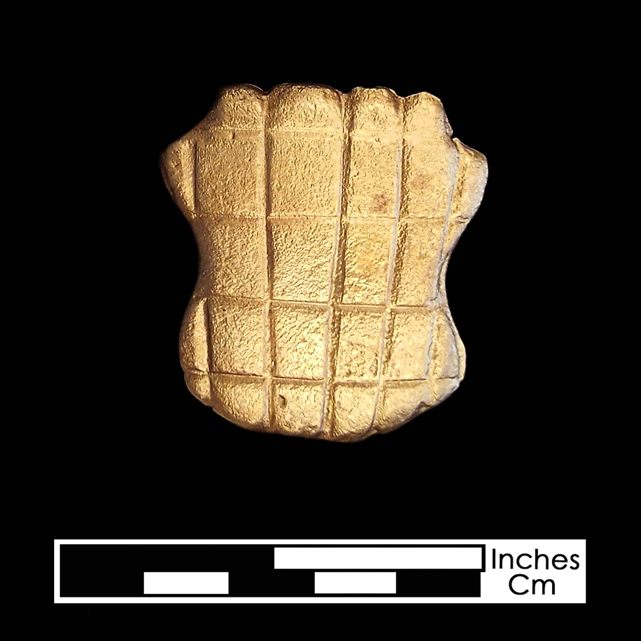 Image of copper alloy leather ornament, Shield.