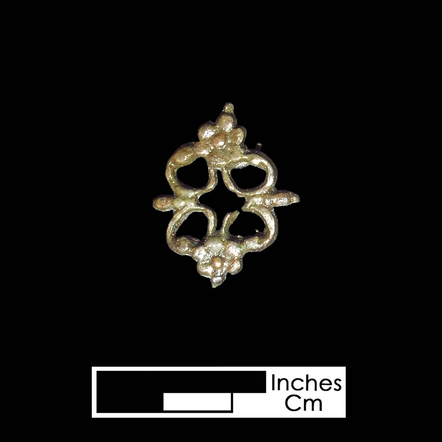 Image of copper alloy leather ornament.
