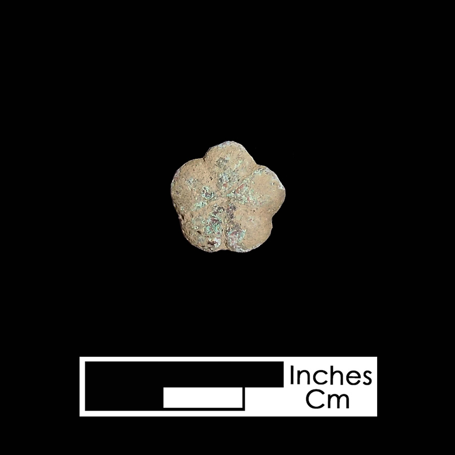 Image of copper alloy leather ornament.