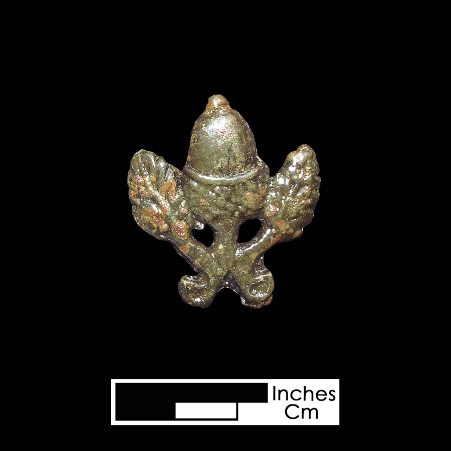 Image of copper alloy leather ornament.