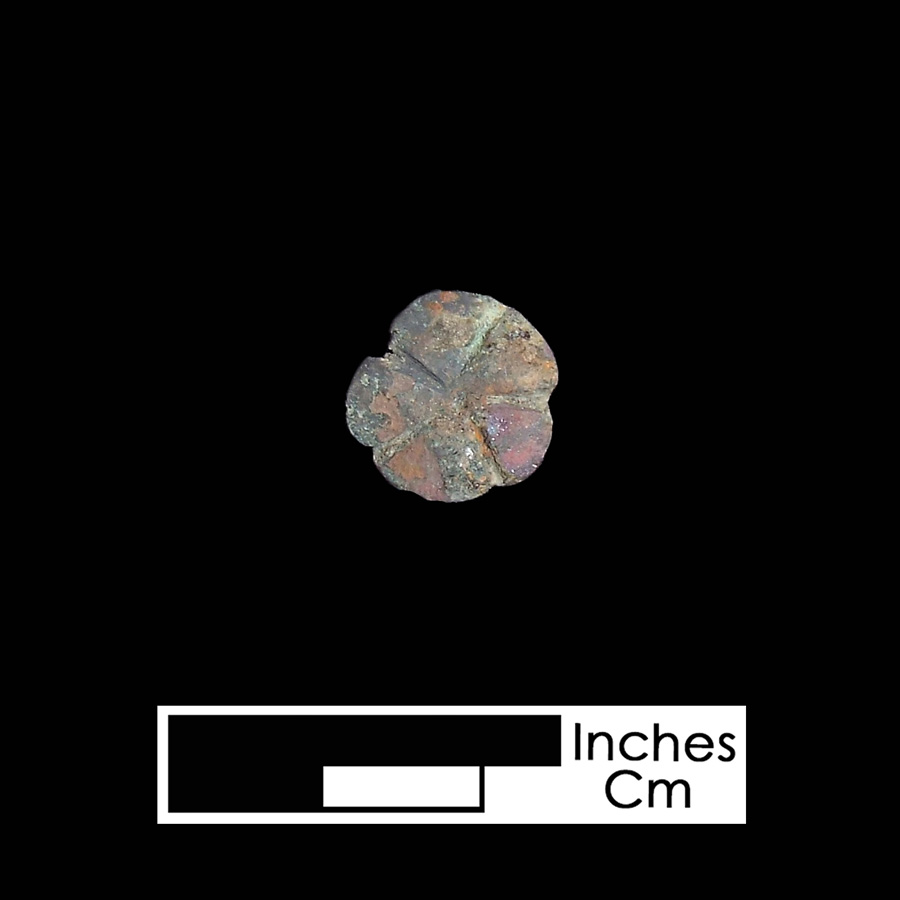 Image of copper alloy leather ornament.