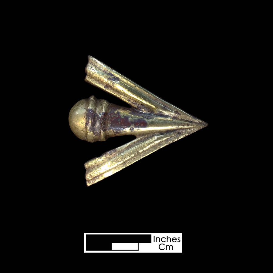 Image of copper alloy leather ornament.