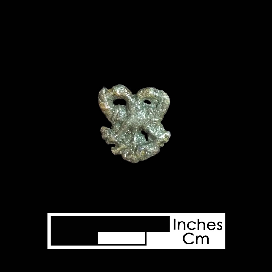 Image of copper alloy leather ornament.