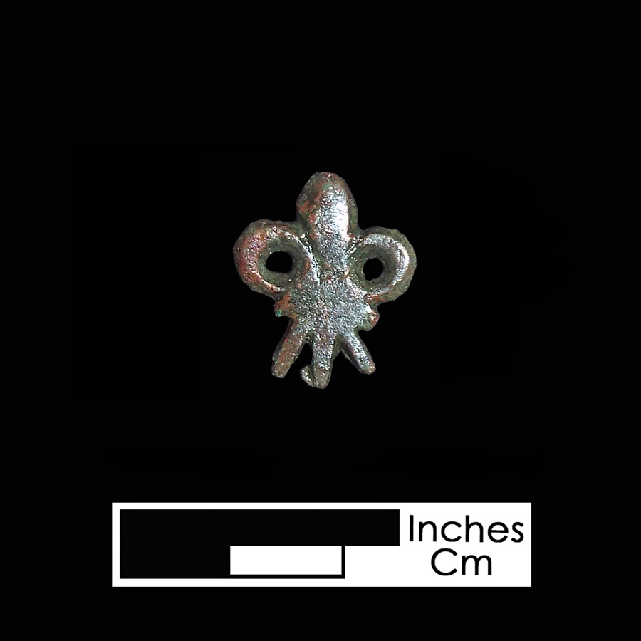 Image of copper alloy leather ornament.
