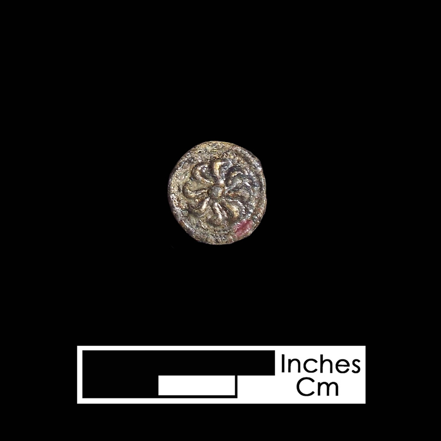 Image of copper alloy leather ornament.