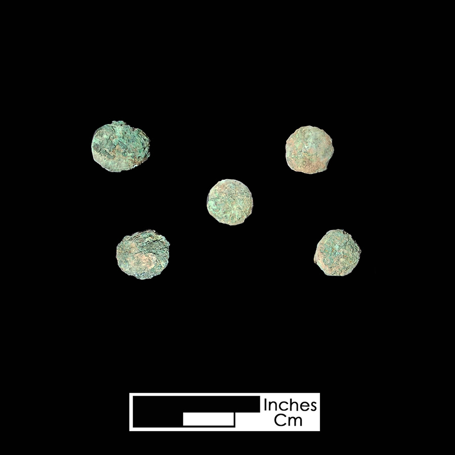 Image of copper alloy leather ornament.