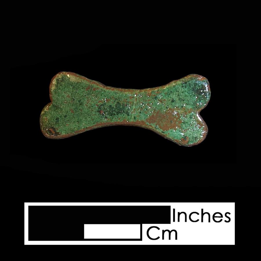 Image of copper alloy leather ornament, bone.