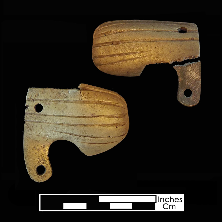 Image of copper alloy saddle part , Incised Lines.