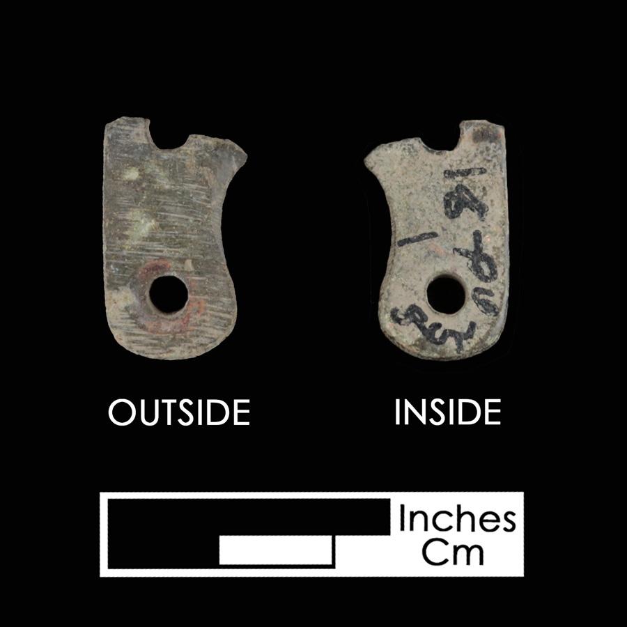 Image of copper alloy saddle part , Incised Lines.