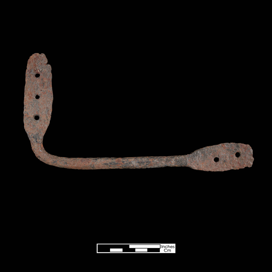 Image of iron saddle part.