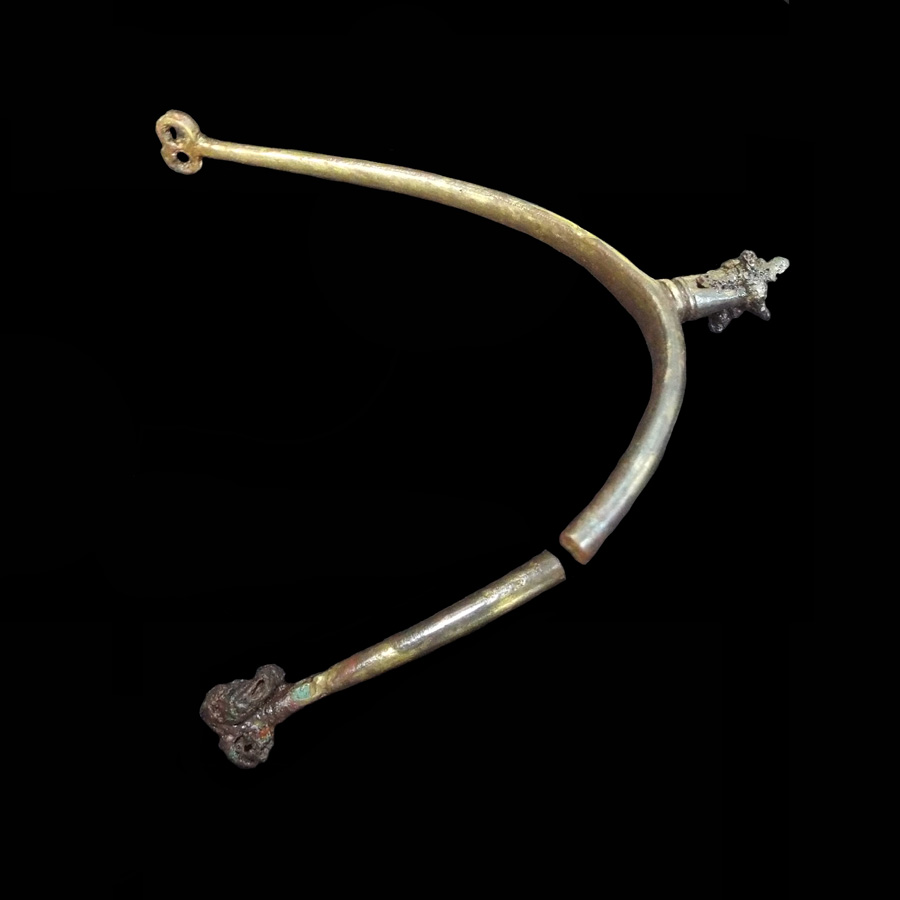 Image of copper alloy spur with copper alloy rowel and iron stud hanger.