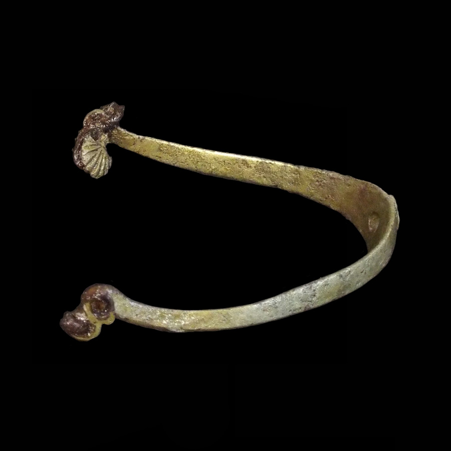 Image of copper alloy spur with iron stud hanger.