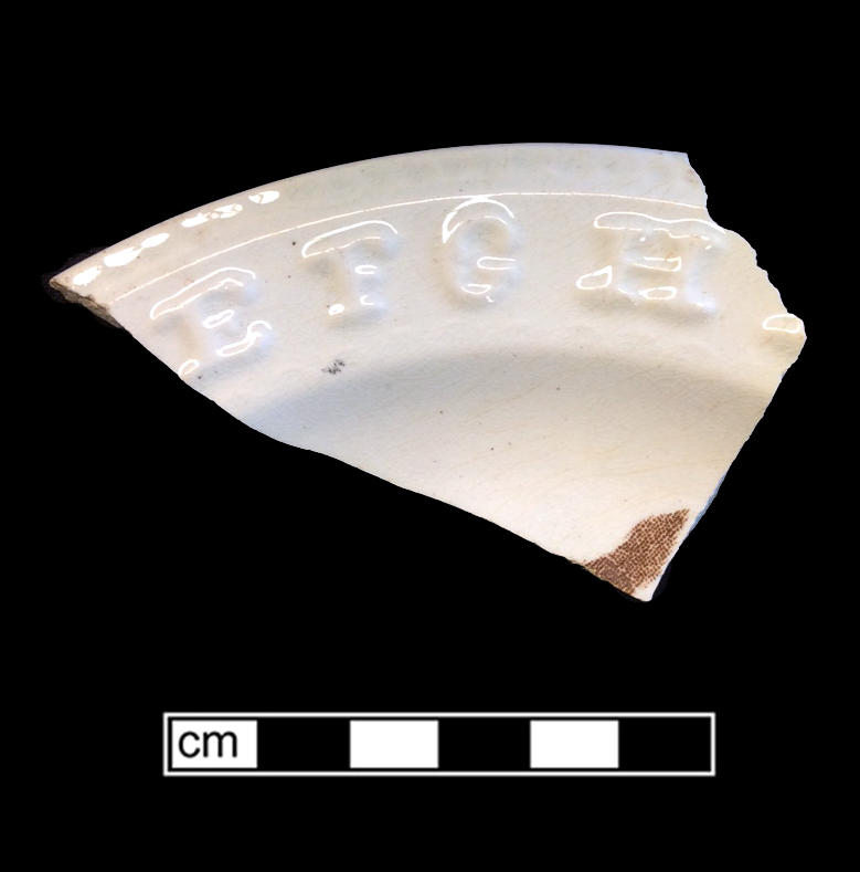 Image of alphabet ware fragment.