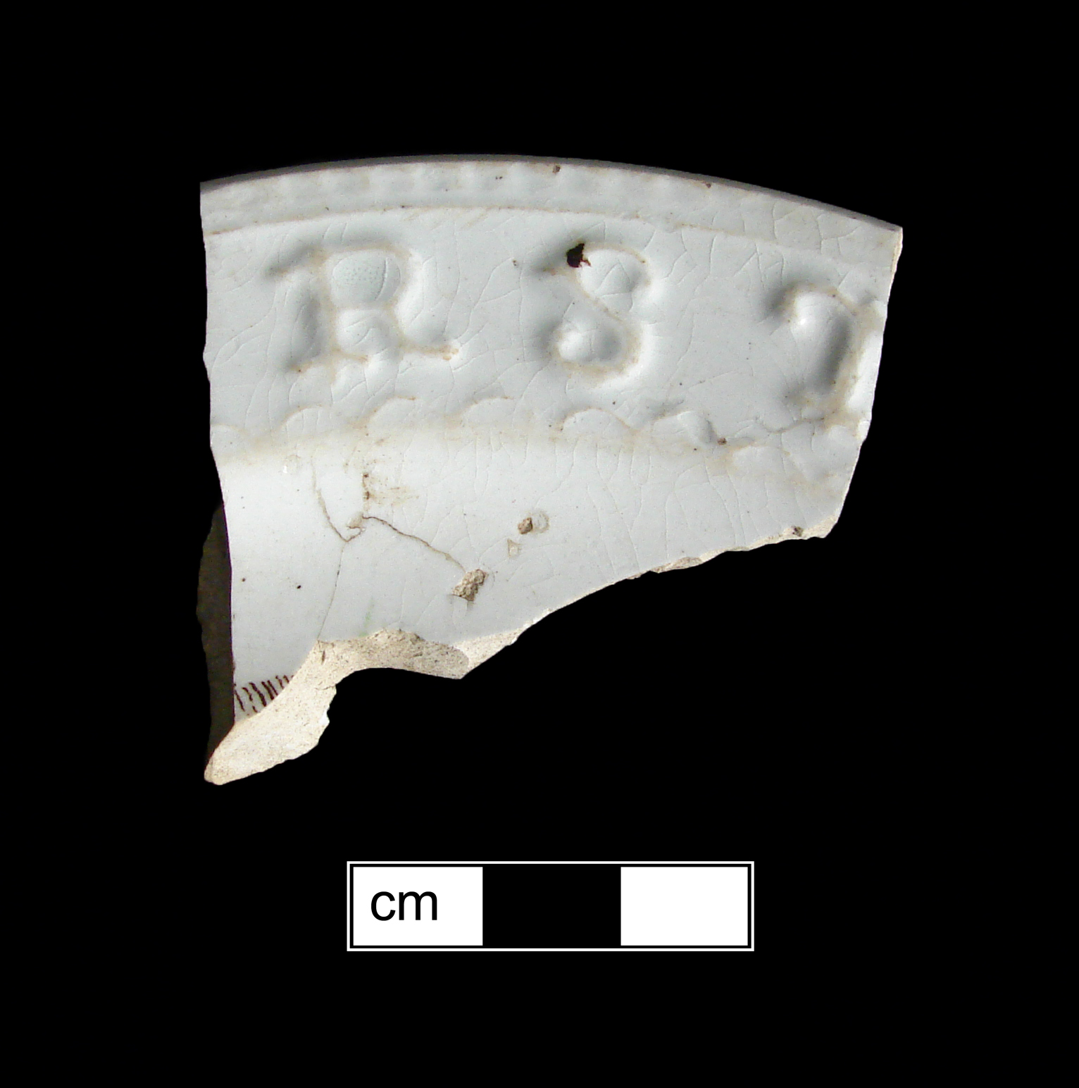 Image of alphabet ware fragment.